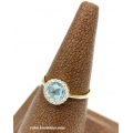 Ring gold K14 with blue topaz
