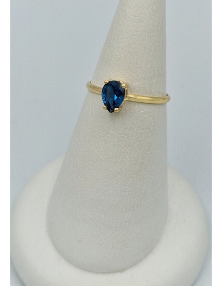 Ring gold K14 with zircon tear blue topaz